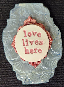 Love Lives Here Word Plaque