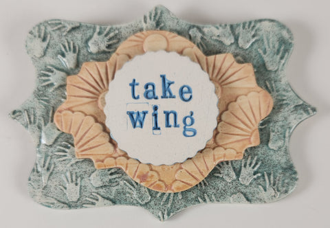 "Take Wing" word plaque