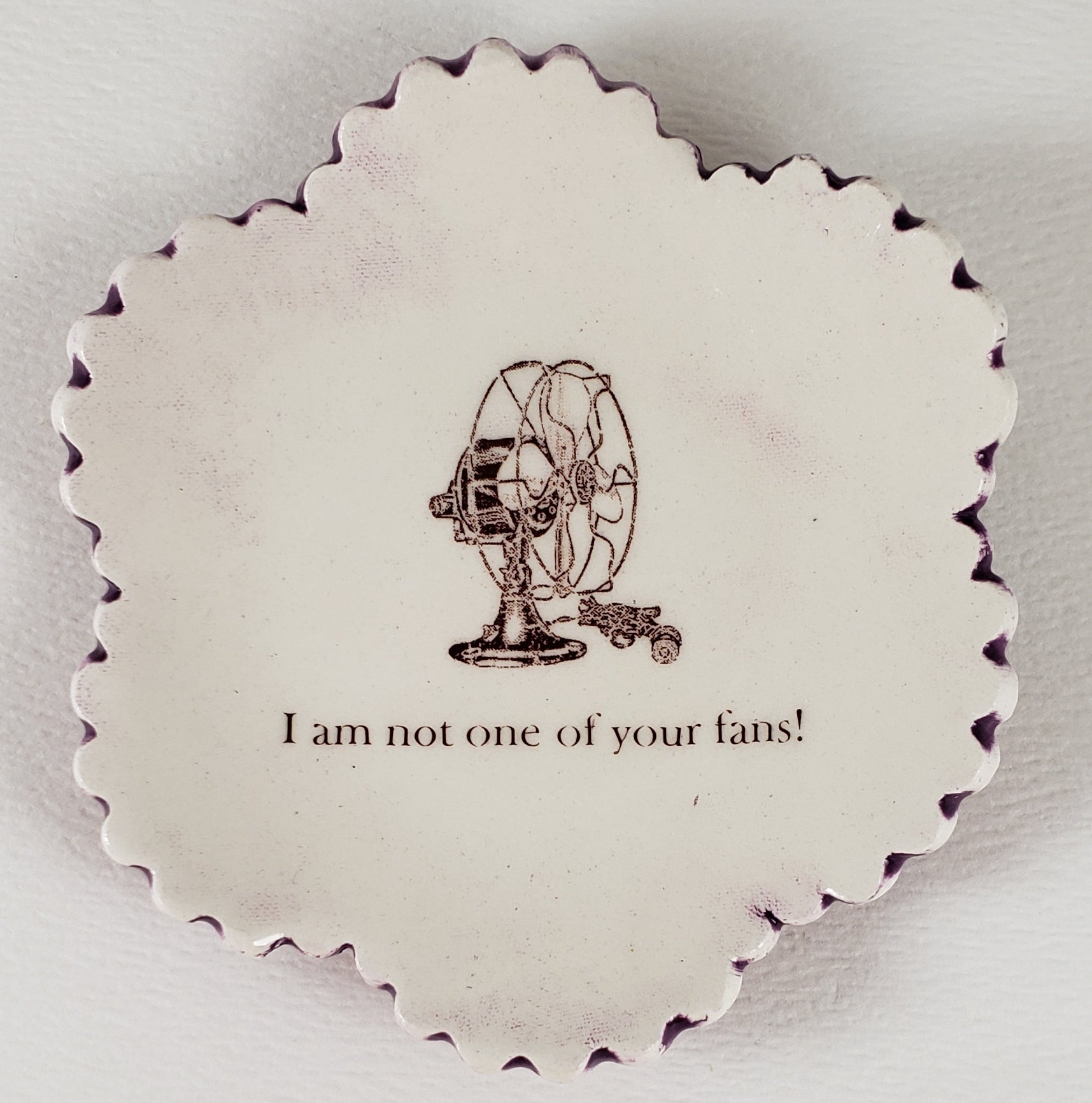 Tiny Plate with "I am not one of your fans!"