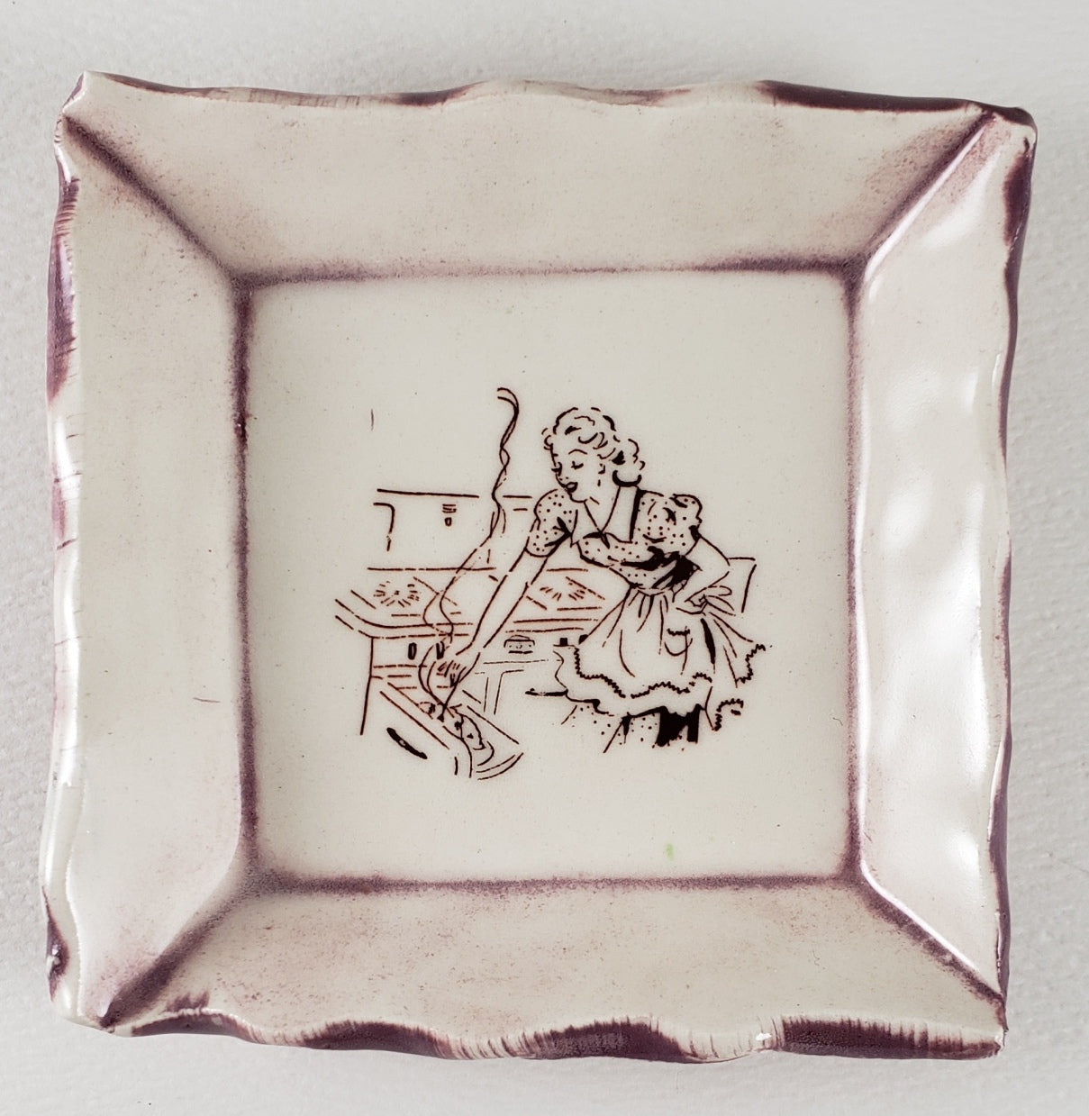 Tiny Plate with a woman cooking